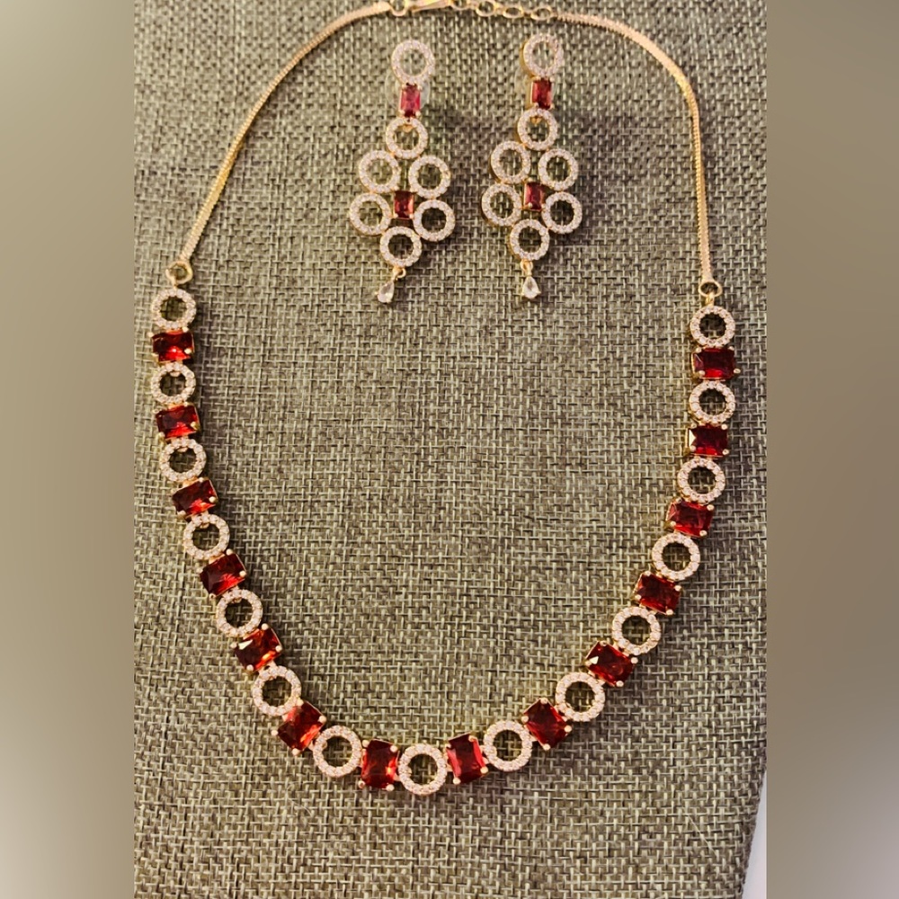 Statement necklace set with earrings.  Gold plated.